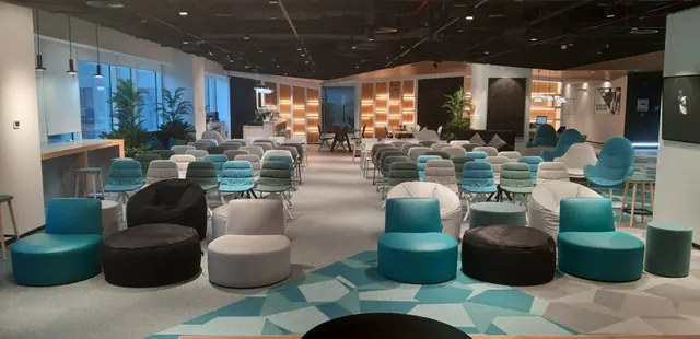 Event space set up with lounge seating for a talk or networking event