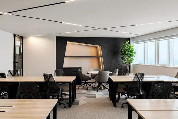 Executive suite breakout area with lounge seating